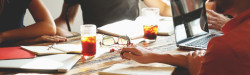 People discussing at the table